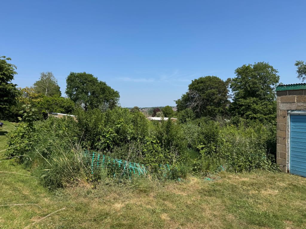 Lot: 28 - APPROXIMATELY THREE QUARTERS OF AN ACRE OF FREEHOLD LAND WITH POTENTIAL - Looking Down the Site from the Rear Service Road